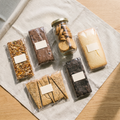 Almost Calm shortbread and bakes flat lay on oat linen