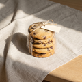 Almost Calm cookie stack tied with twine on oat linen