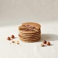 Stack of Nutella chocolate-hazelnut stroopwafels on bone linen