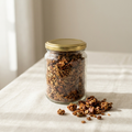 Jar of nolen gur oats and seeds granola