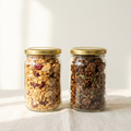 Two granola jars side by side